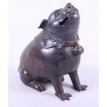 A Chinese bronze censer, formed as a Dog of Fo, 7" high