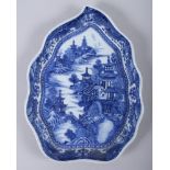 A Chinese blue and white porcelain leaf dish with proto willow pattern, 7 3/4" long