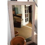 A limed pine frame wall mirror, plate 23 1/2" x 51"