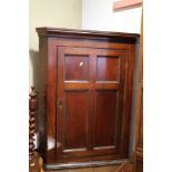 A Georgian oak corner cupboard with three shelves enclosed panelled door, 29" wide x 37 1/2" high