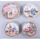 Three late 18th century porcelain figure decorated saucers and a similar saucer, boy in the window