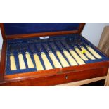 A set of twelve late 19th century plated and engraved fish knives and forks with ivory handles, in