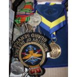 Four WWII General Service Medals, two WWII Defence Medals, two 1939-45 Stars, and MOD cloth badge, a