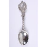 A Dutch silver serving spoon, by Samuel Boyce Landeck, with cast and pierced stem and handle,