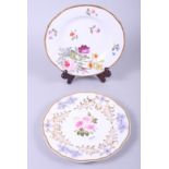 An early 19th century lilac sprigged and floral enamel decorated dessert plate, 8 3/4" dia, and a