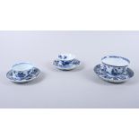 Three early 19th century blue and white porcelain tea bowls and saucers