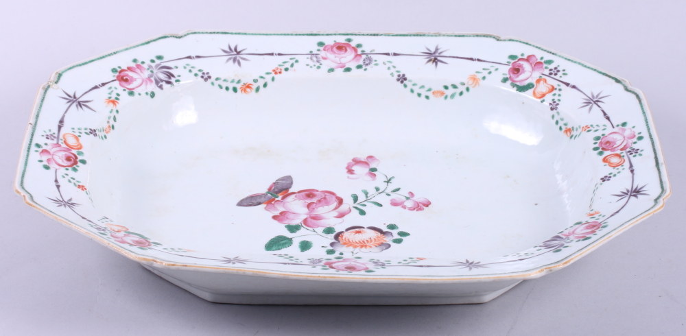 An 18th century Chinese export octagonal meat dish with butterfly and flower decoration, 14 1/2"