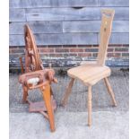 An Ashford hardwood spinning wheel and a similar spinning stool