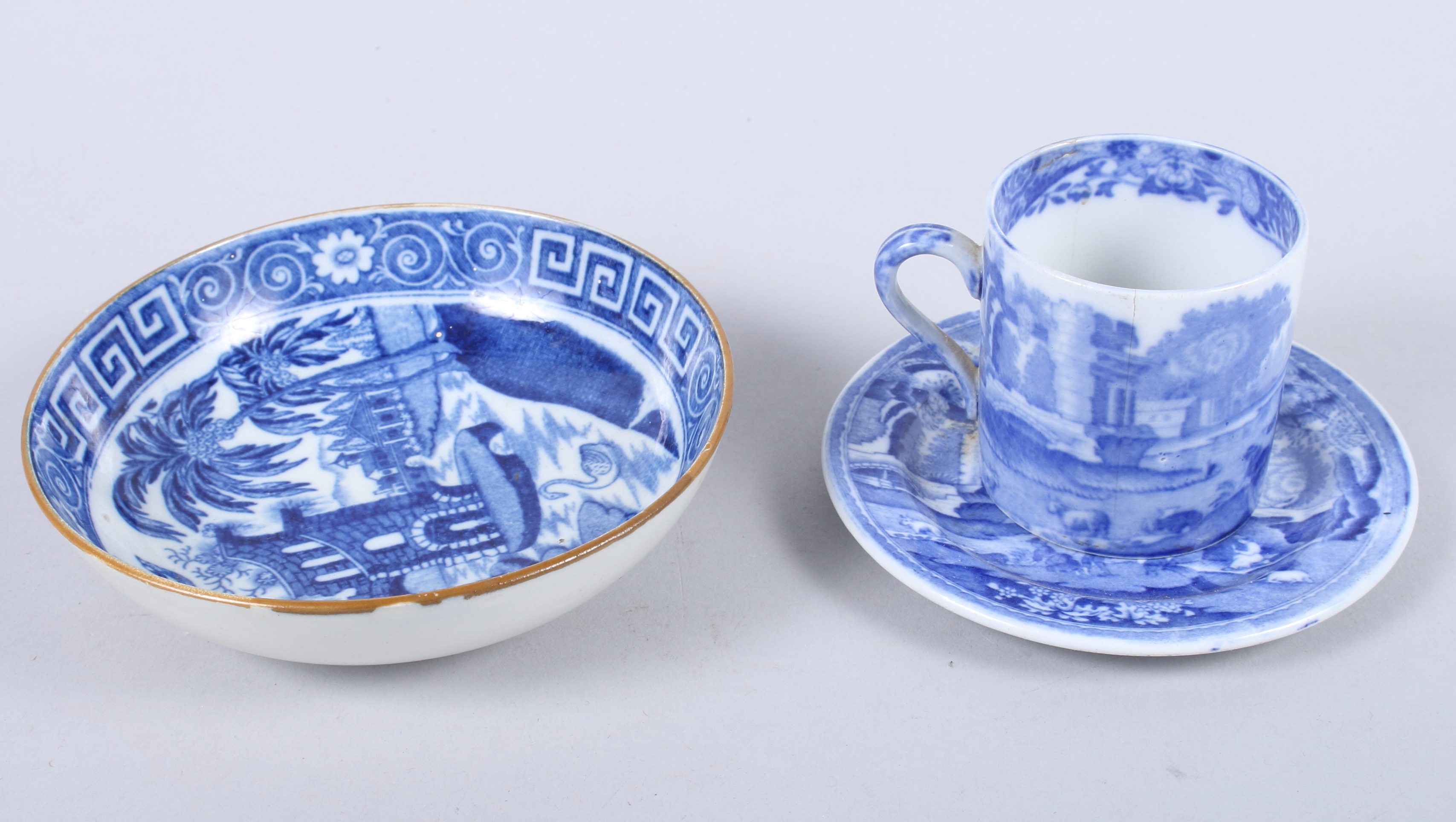 An early 19th century blue and white transfer decorated saucer with ruin and swan design, 5" dia,