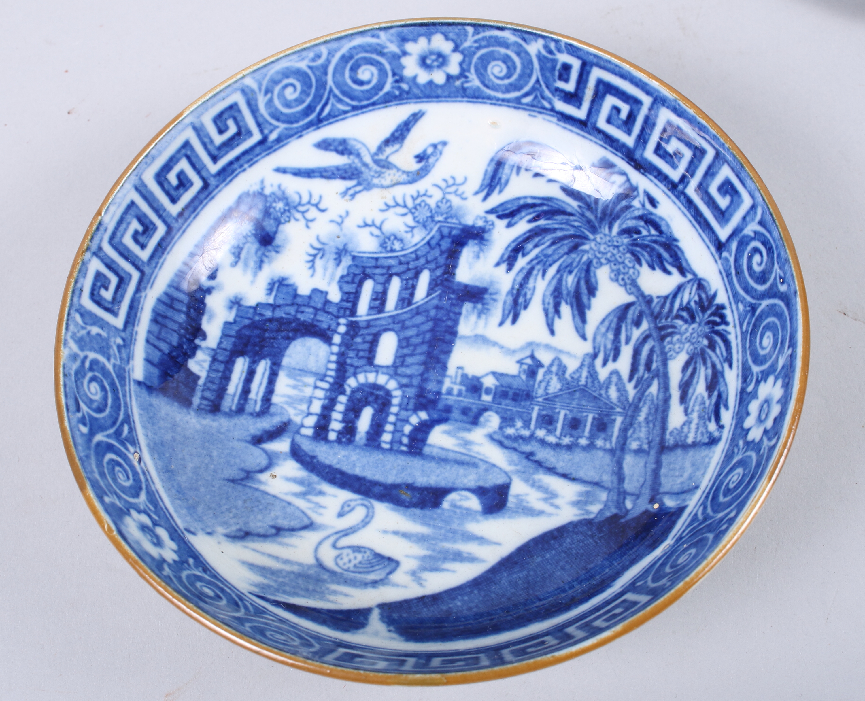 An early 19th century blue and white transfer decorated saucer with ruin and swan design, 5" dia, - Image 2 of 4