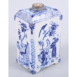 An 18th century Delft tea caddy with "Long Liza" decoration, 4 1/2" high (slight damages)