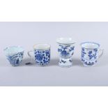 A 19th century Chinese blue and white porcelain cup with precious object decoration, and three other