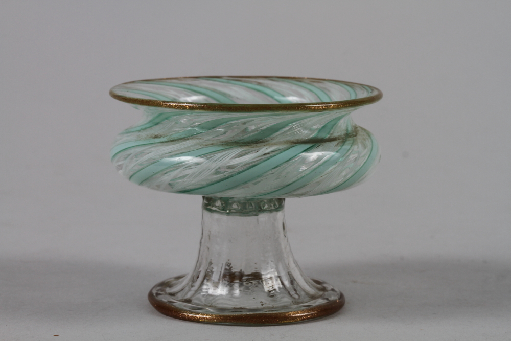 A Venetian green and white spiral glass salt with aventurine rim and folded foot, 2 1/2" dia