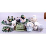 A Continental china soup tureen, formed as a duck, a similar cruet set, asparagus dish, cover and