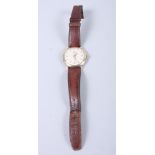 A gentleman's vintage Longines manual wind wristwatch with 10ct gold filled case and chequered