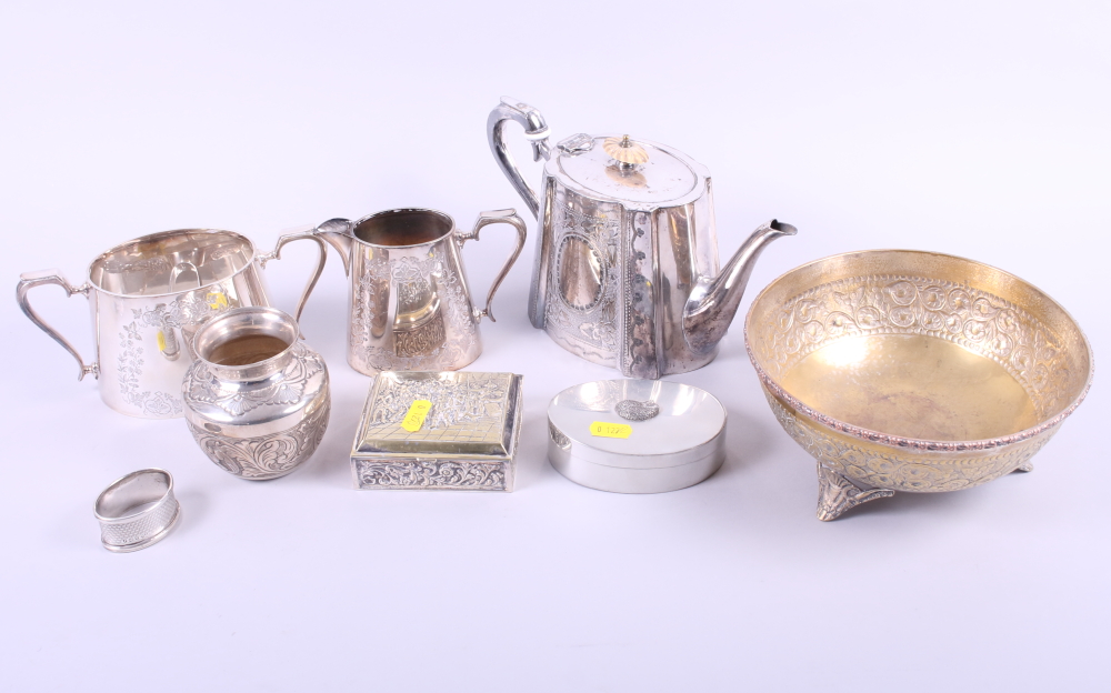 An EPBM three-piece teaset, a pewter box, an embossed vase, an embossed bowl and an embossed box