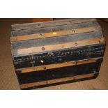 A fabric covered and wooden bound dome trunk, by Jenkins Bros, 28" wide