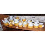 A Midwinter Stonehenge "Sun" pattern tea service, including two teapots, a milk jug, sugar (