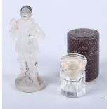 An Art Deco pressed glass figure of a Pierrot, 3" high, and a 19th century cut glass vinaigrette /