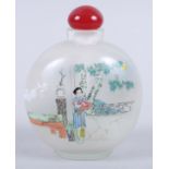 A Chinese reverse painted glass snuff bottle, decorated figures in landscapes, 5" high