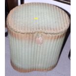 A green and gold coloured Lloyd Loom linen basket, a folding bridge table and a nest of three