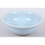 An antique Chinese porcelain footed bowl, decorated in a pale blue glaze, 6" dia (hairline cracks