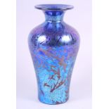 A baluster-shaped iridescent blue lustre vase, signed to base, 9 1/2" high