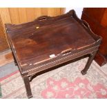 A 20th century mahogany tray top table with two candle slides, on square chamfered supports, 26"