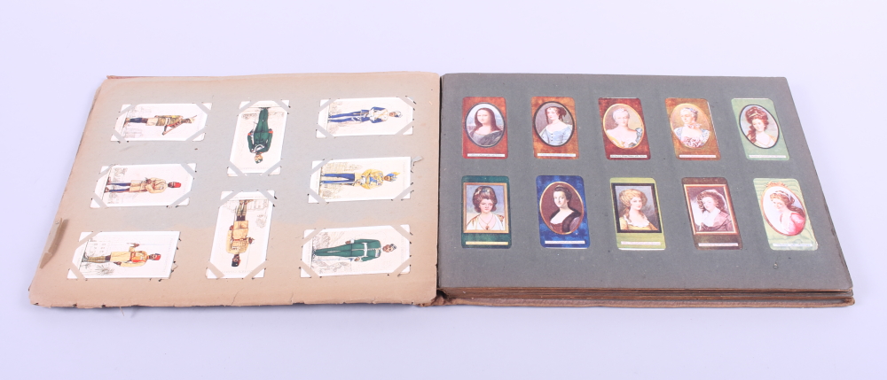 An album of cigarette cards, including "The Mona Lisa after Da Vinci", birds, ships, etc