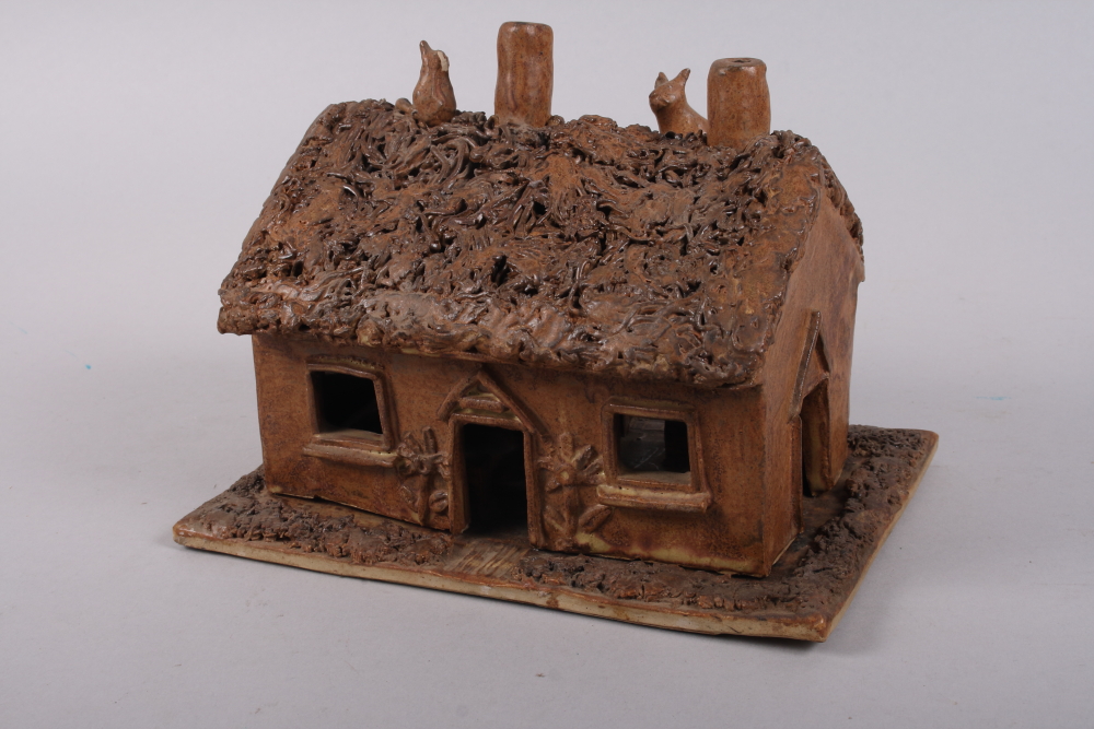 A studio pottery model cottage night light, 9 1/4" wide