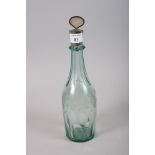 A mid 19th century green engraved glass spirit decanter with mother-of-pearl stopper, 13" high