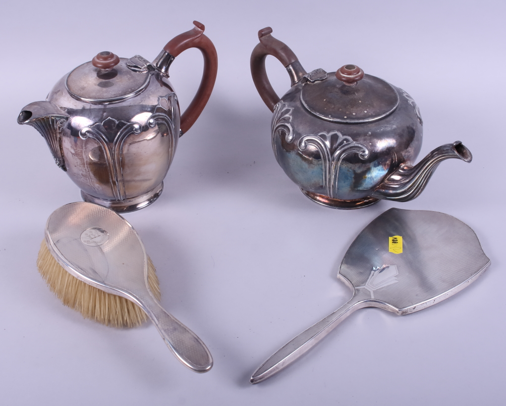 A Walker & Hall silver plated teapot, a similar hot water pot, and an Art Deco silver dressing table