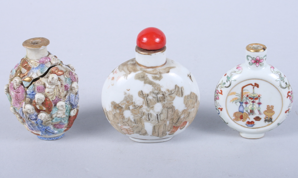 A Chinese porcelain moon-shaped snuff bottle, decorated precious objects, seal mark to base, another