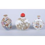 A Chinese porcelain moon-shaped snuff bottle, decorated precious objects, seal mark to base, another