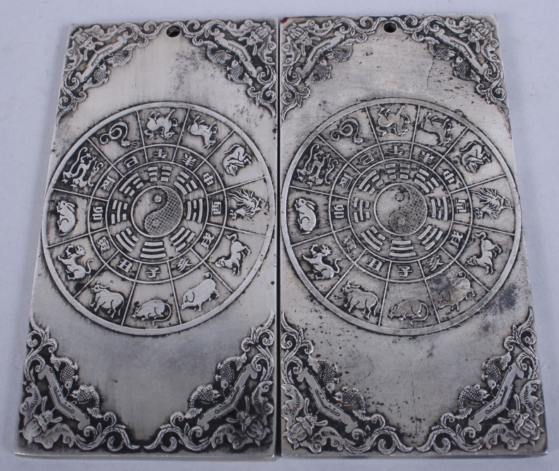 A pair of Chinese Zodiac silvered ingots, children, 4" long - Image 2 of 2