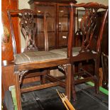A set of four 19th century mahogany dining chairs of Chippendale design with pierced splats and