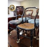 A pair of Victorian Japanned and mother-of-pearl inlaid bedroom chairs and similar papier-mache