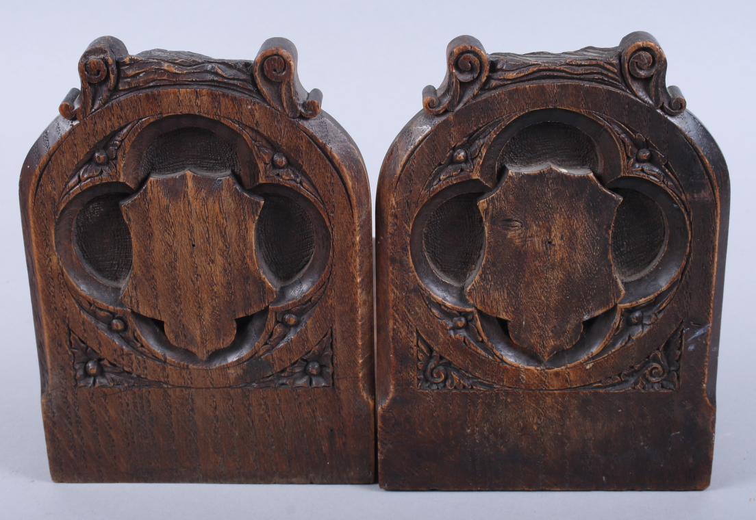 A pair of Victorian Gothic carved oak bookends - Image 2 of 3