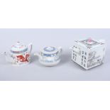 A Chinese porcelain square-section teapot with landscape and character decoration and two others