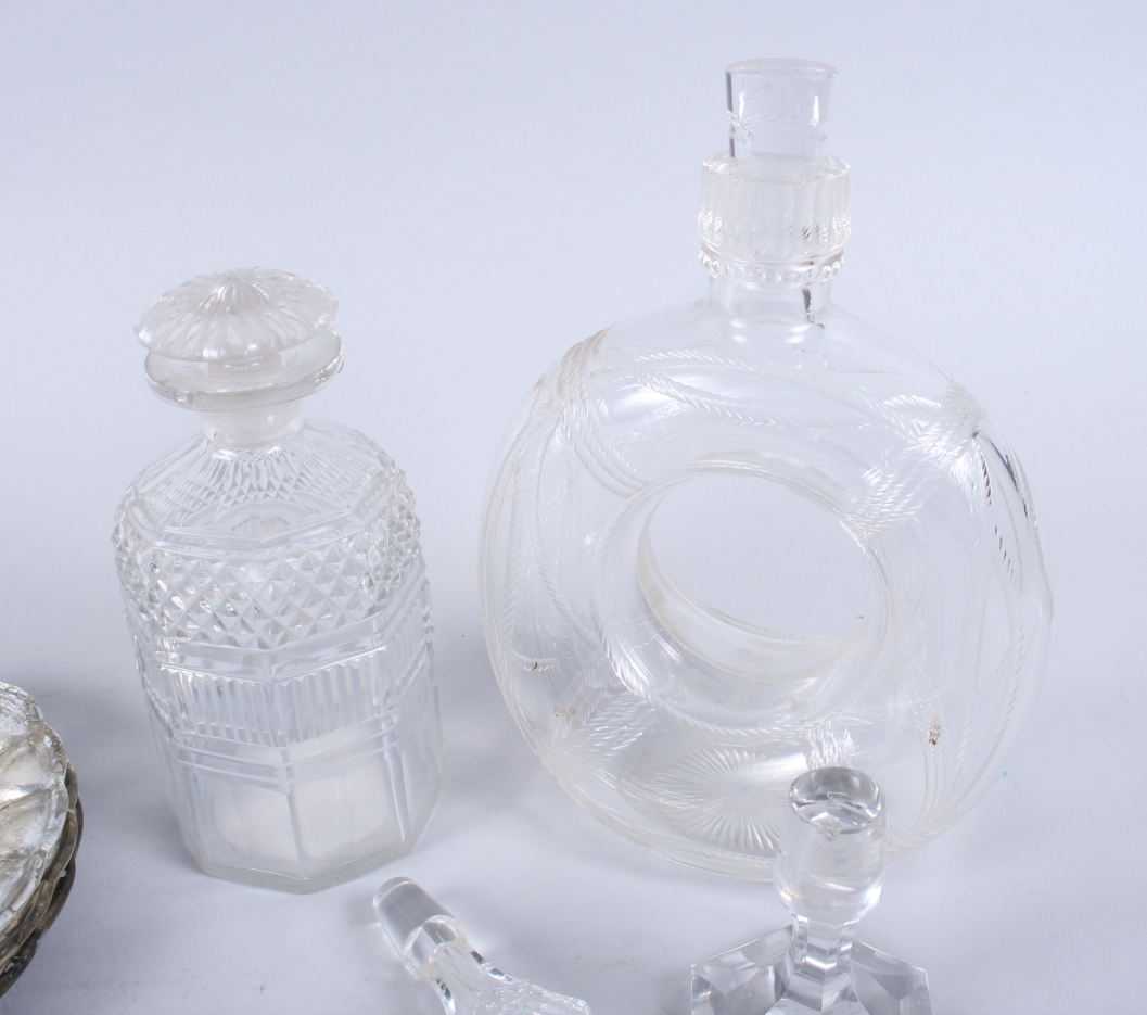 A Victorian novelty glass decanter, in the form of a life belt, a 19th century octagonal cut glass - Image 2 of 3