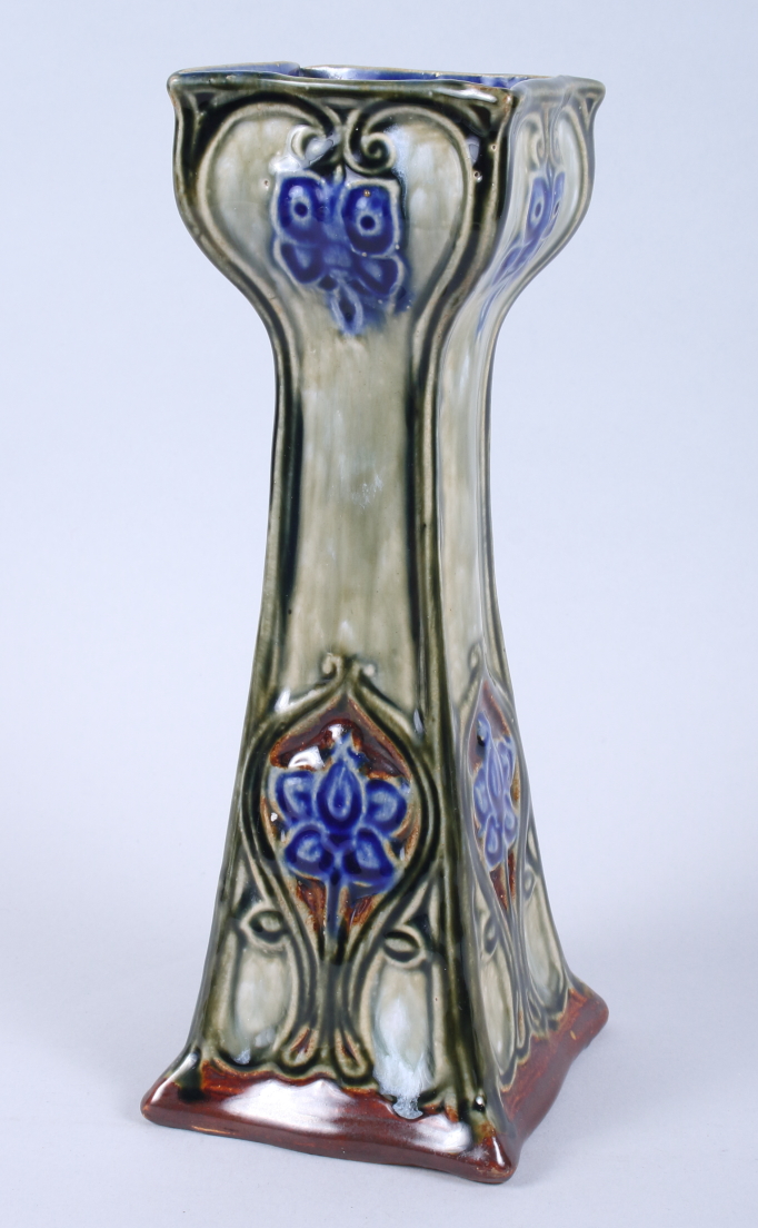 A Royal Doulton Emily Partington green and blue glazed Secessionist vase with floral decoration,