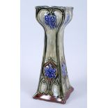 A Royal Doulton Emily Partington green and blue glazed Secessionist vase with floral decoration,