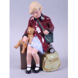 A Royal Doulton figure, "Girl Evacuee" HN3203