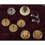 A pair of 18ct gold shirt studs, a yellow metal pair of shirt studs and five other similar studs (