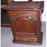 An oak, holly and bog oak inlaid cupboard enclosed arch top door over one drawer, 21" wide x 24"