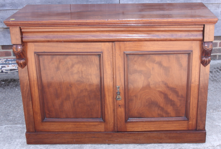 A late Victorian sideboard, fitted one long drawer over cupboards, on block base, 50" wide x 35"