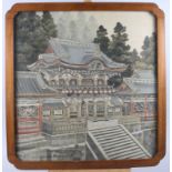 A Japanese hand-painted silk panel of a temple, in hardwood shaped frame, 21 1/2"