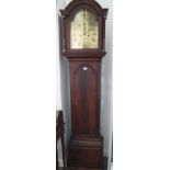 A mahogany long case clock with eight-day movement and brass dial, seconds register and date