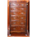 A burr walnut chest of six long graduated drawers, on splayed supports, 22 1/2" wide