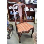 An antique walnut Dutch marquetry side chair with drop-in seat, on cabriole supports